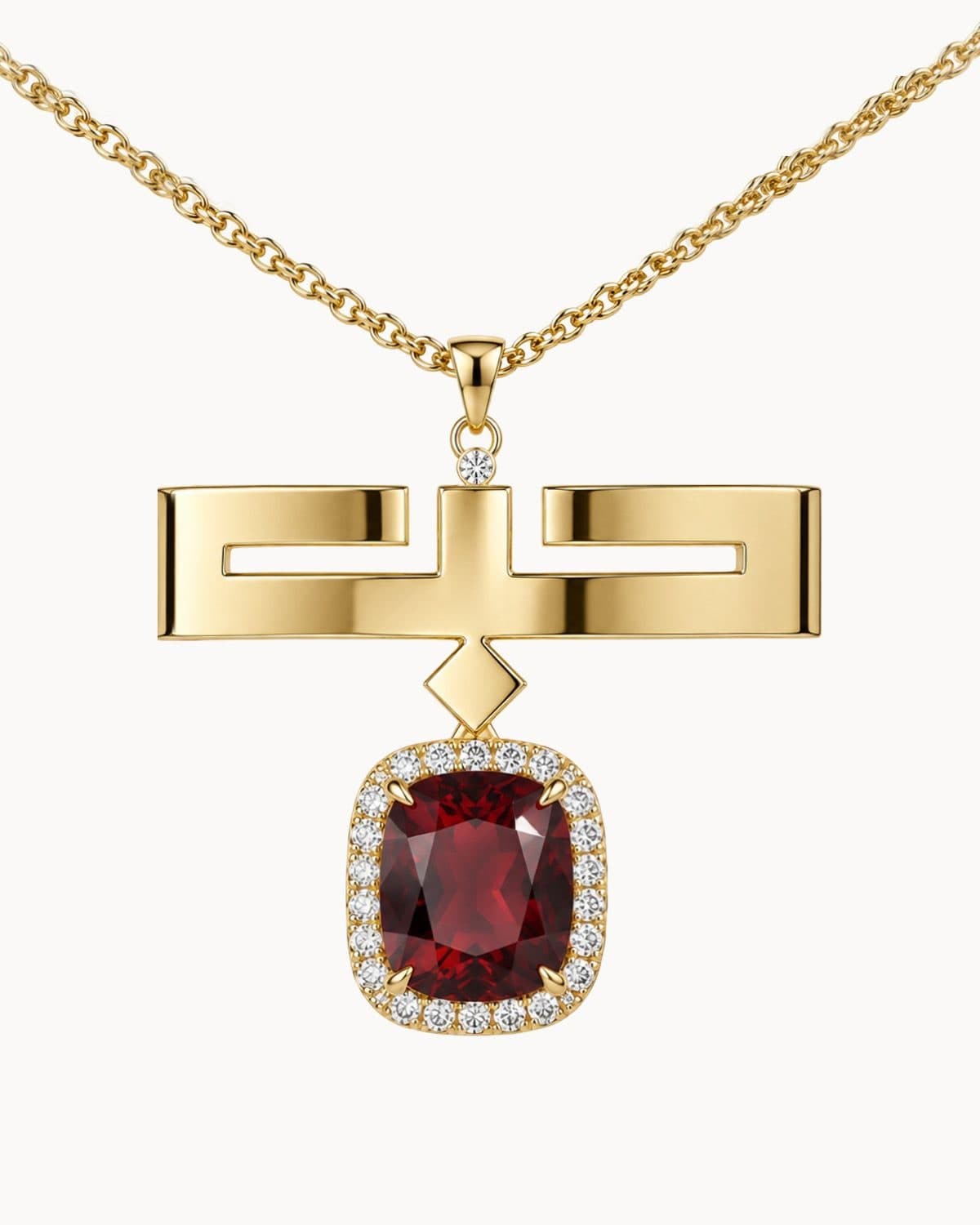 The Love Necklace in 18K gold, set with a natural red garnet.